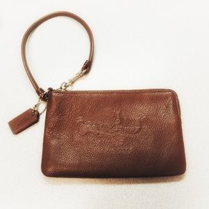 Wristlete dark tan, coach